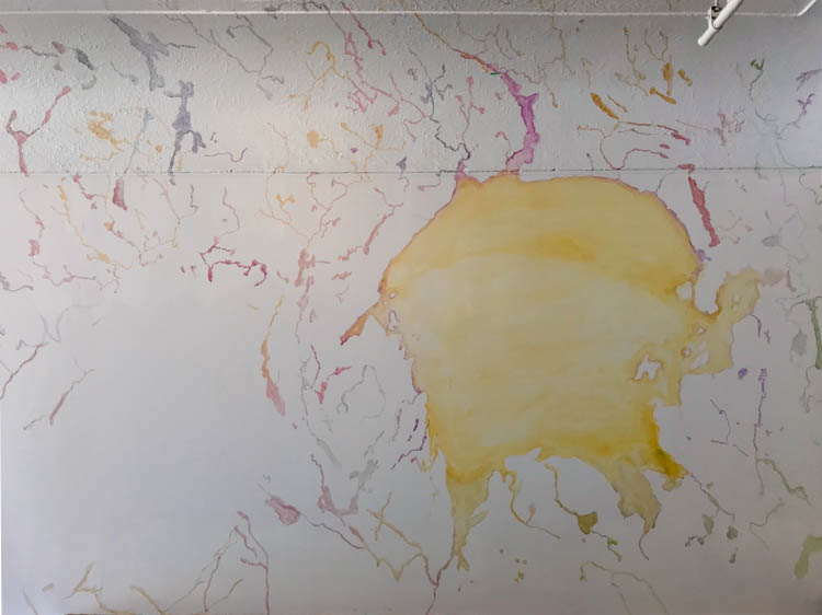 Site specific wall painting at the GNO sudbury ontario showing rivers and interpretation of the grand lake Wanapitei painting in sulfur yellow